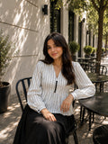 Classic Striped Peplum Top & Black Maxi Skirt Co-ord Set for Women styled casually outdoors