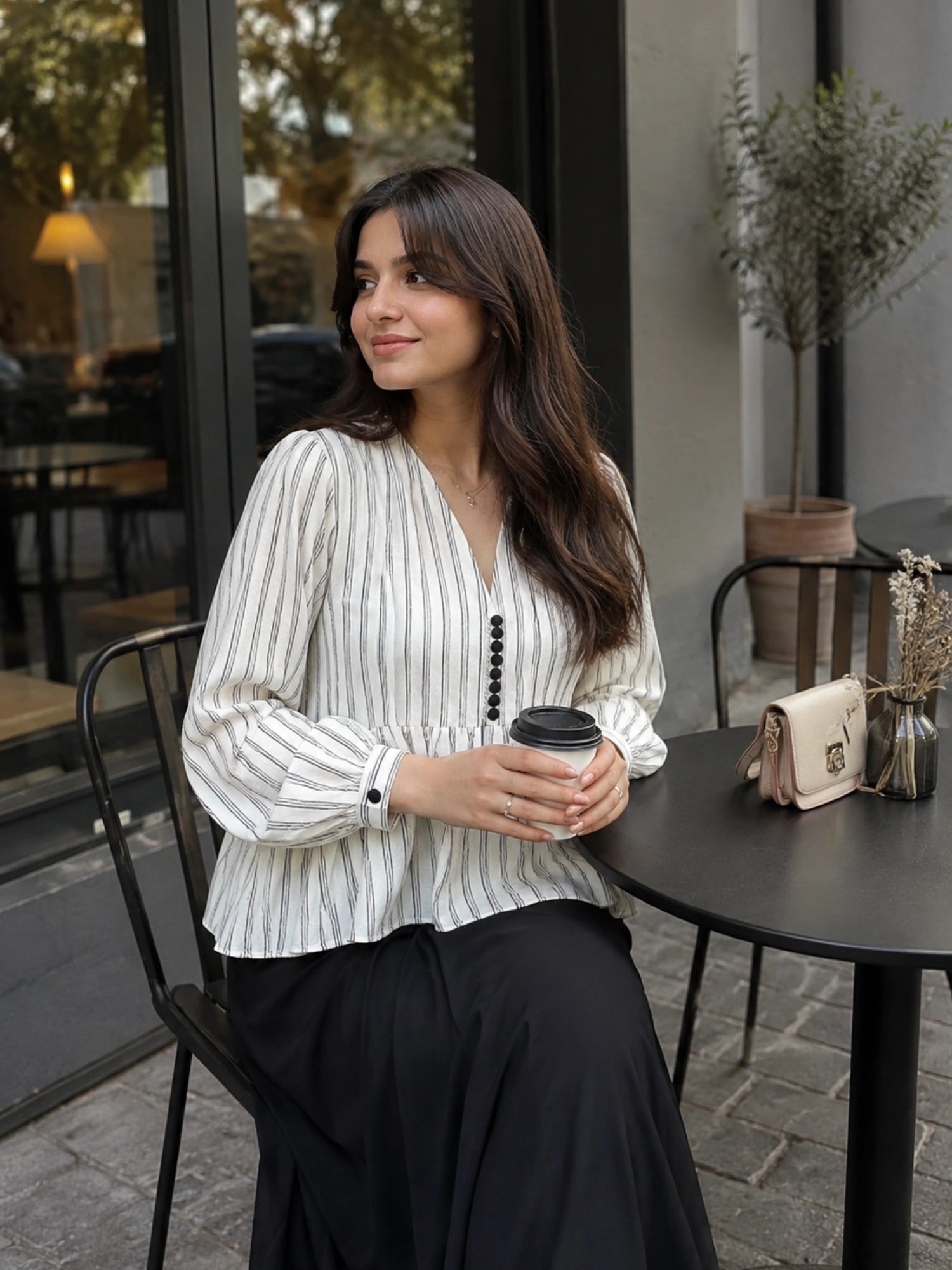 Classic Striped Peplum Top & Black Maxi Skirt Co-ord Set for Women styled in a cafe setting