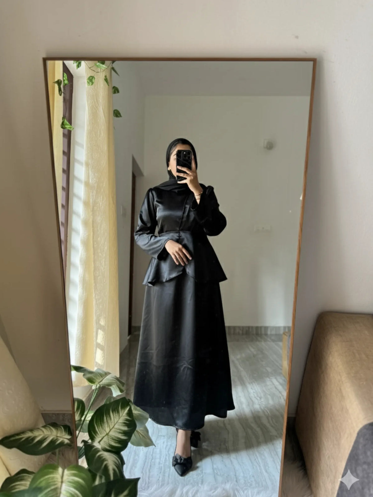 Yezwe Black Co-Ord Set featuring a peplum top and long skirt, perfect for stylish occasions