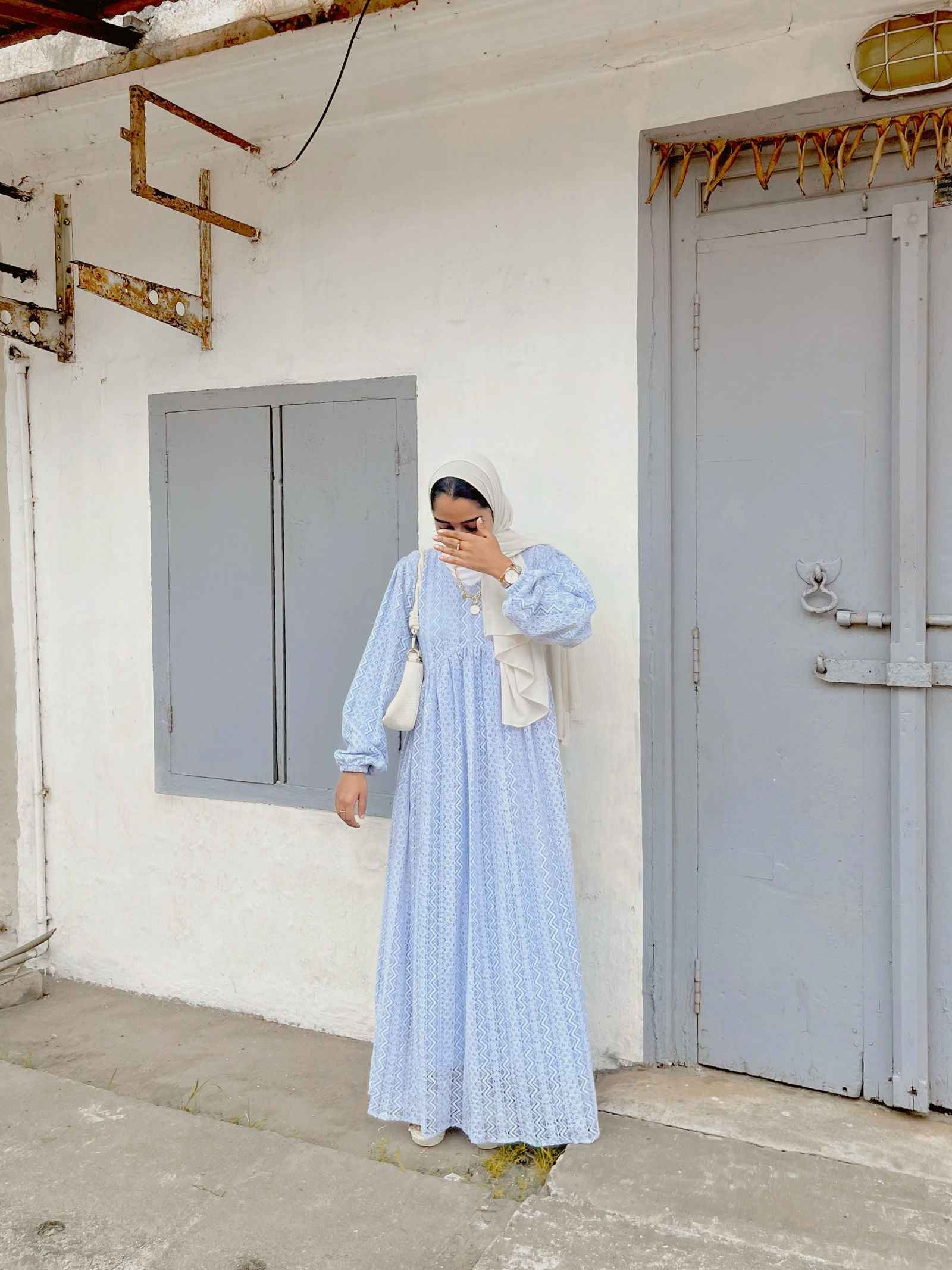 Yezwe Customizable Modest Maxi Dress in light blue with puff sleeves and a flowing silhouette
