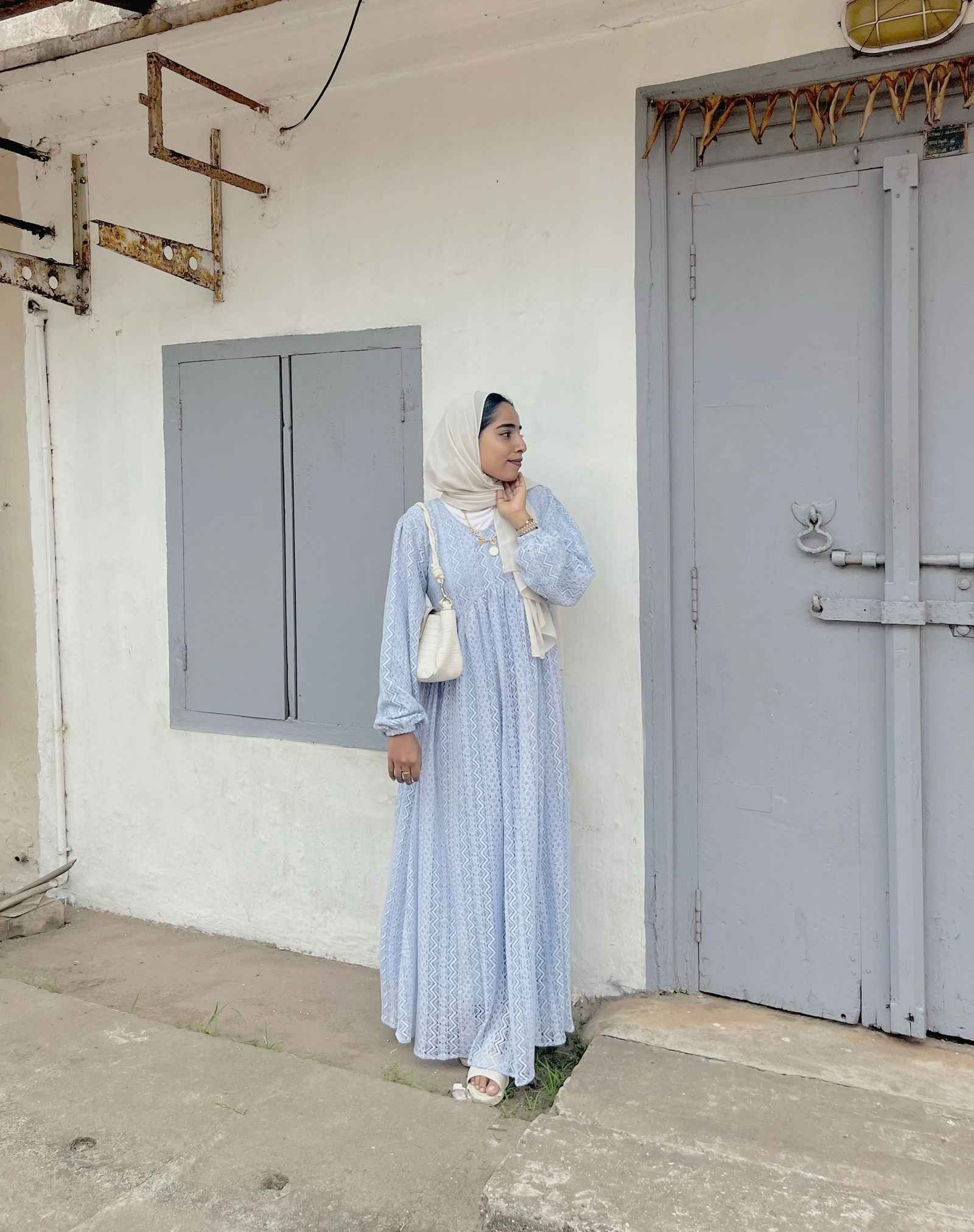 Yezwe Customizable Modest Maxi Dress in light blue with long sleeves and elegant design for versatile wear