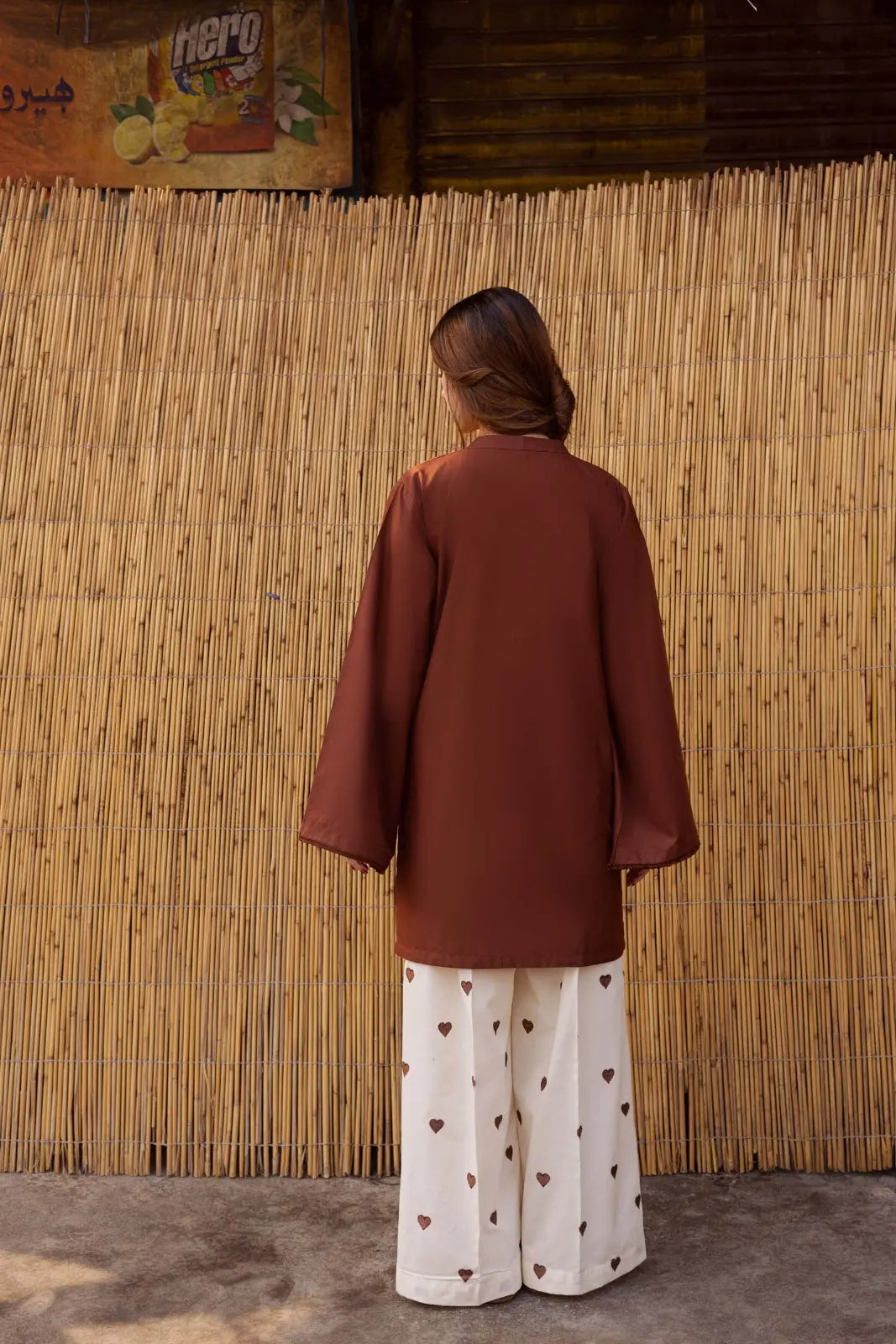 YEZWE Co-Ord Set featuring a brown top and white printed pants, perfect for casual outings