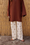 YEZWE Co-Ord Set featuring a brown top and cream pants with heart prints for a stylish look