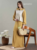 Golden Modest Maxi Dress with Hakoba Shrug styled elegantly with a woven bag
