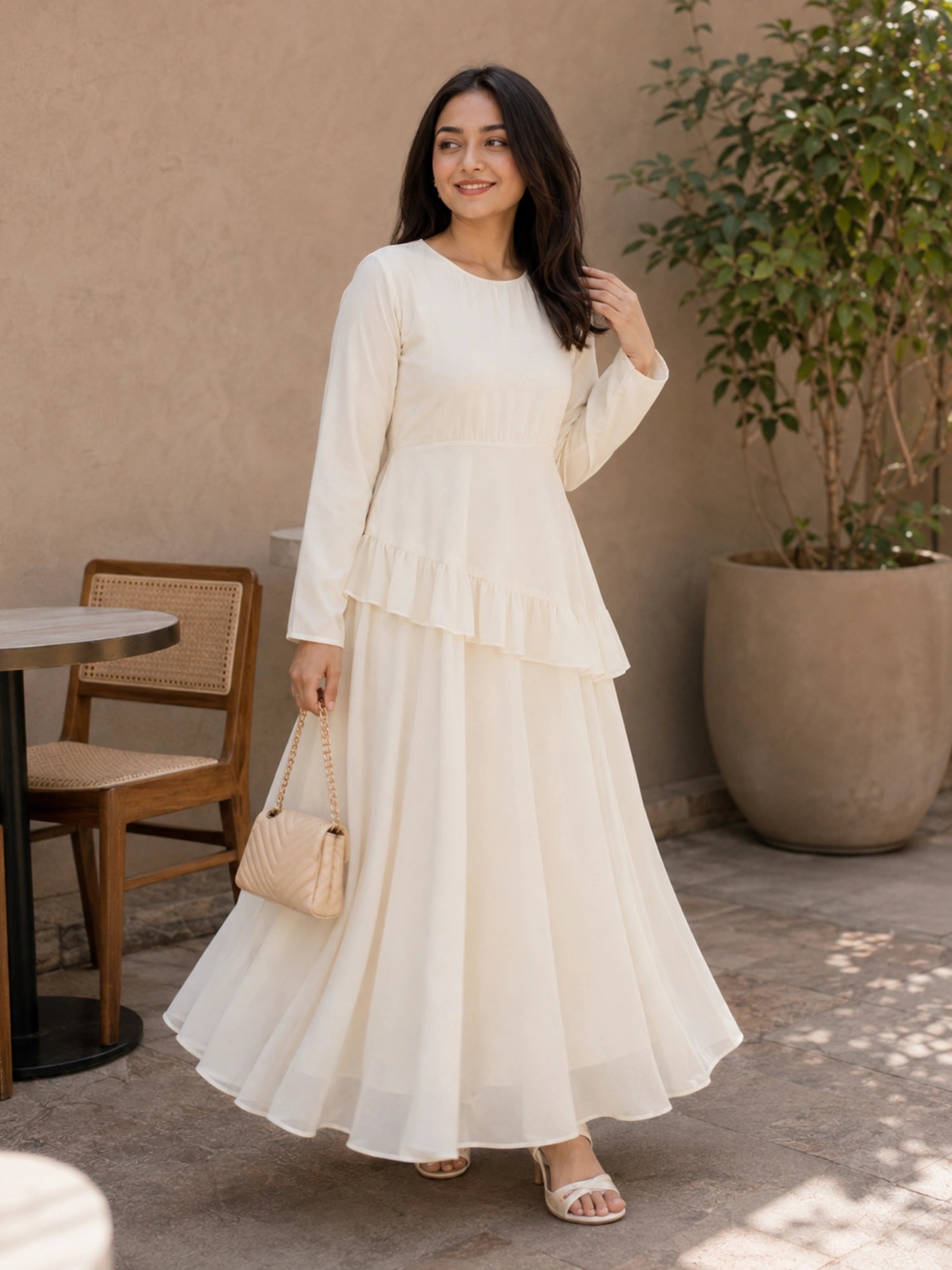 Stylish Ivory Faux Georgette Asymmetric Ruffle Maxi Dress with long sleeves and flared skirt