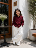 Junior Girls Wine Bow Shirt & Wide Leg Pants Co-Ord Set in a stylish café setting