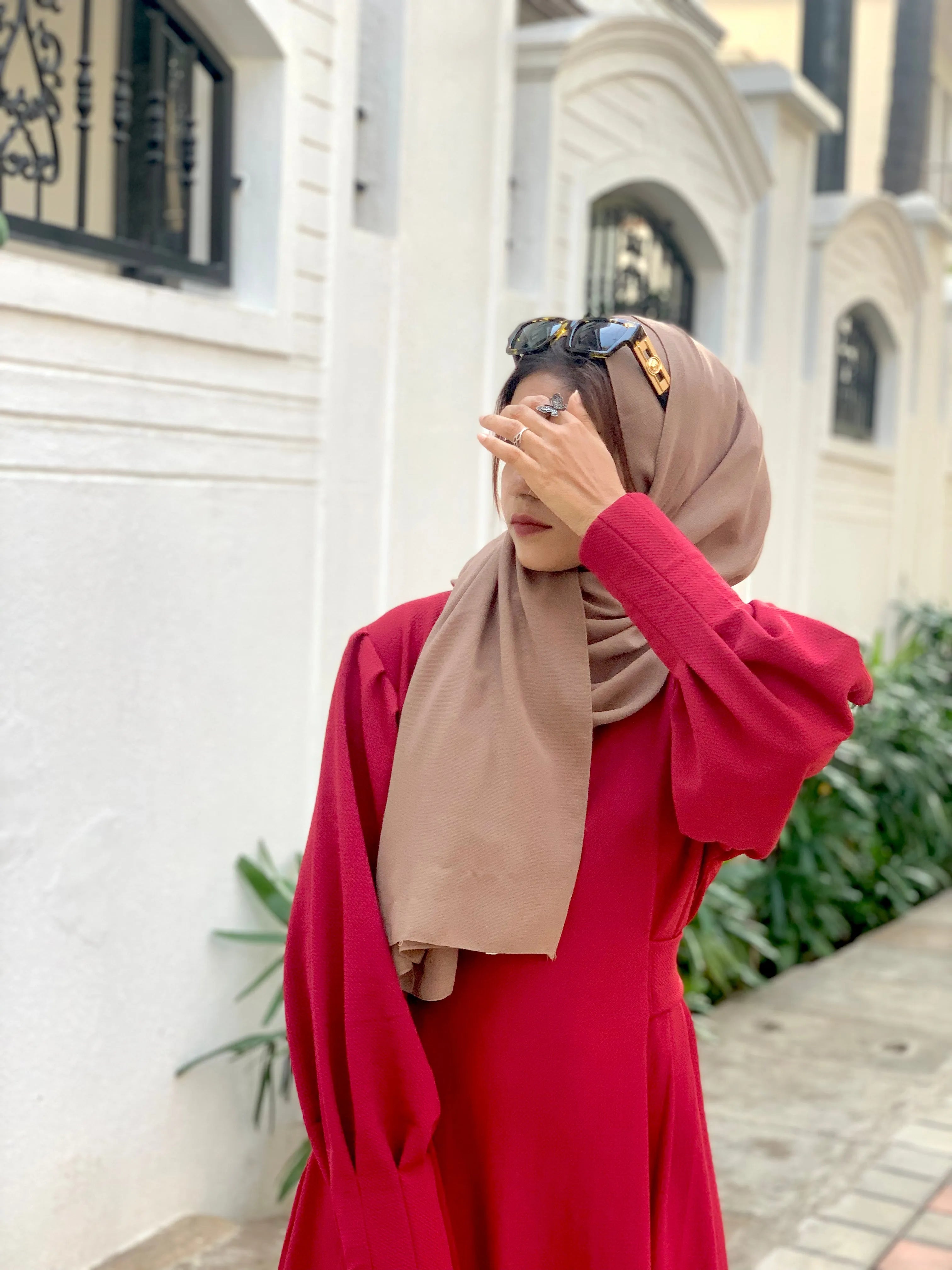 Yezwe knitted Modest maxi dress for women in vibrant red, featuring long sleeves and a stylish silhouette