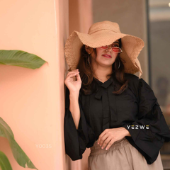 Modest black co-ord set featuring a stylish blouse and chic pants for trendy casual wear