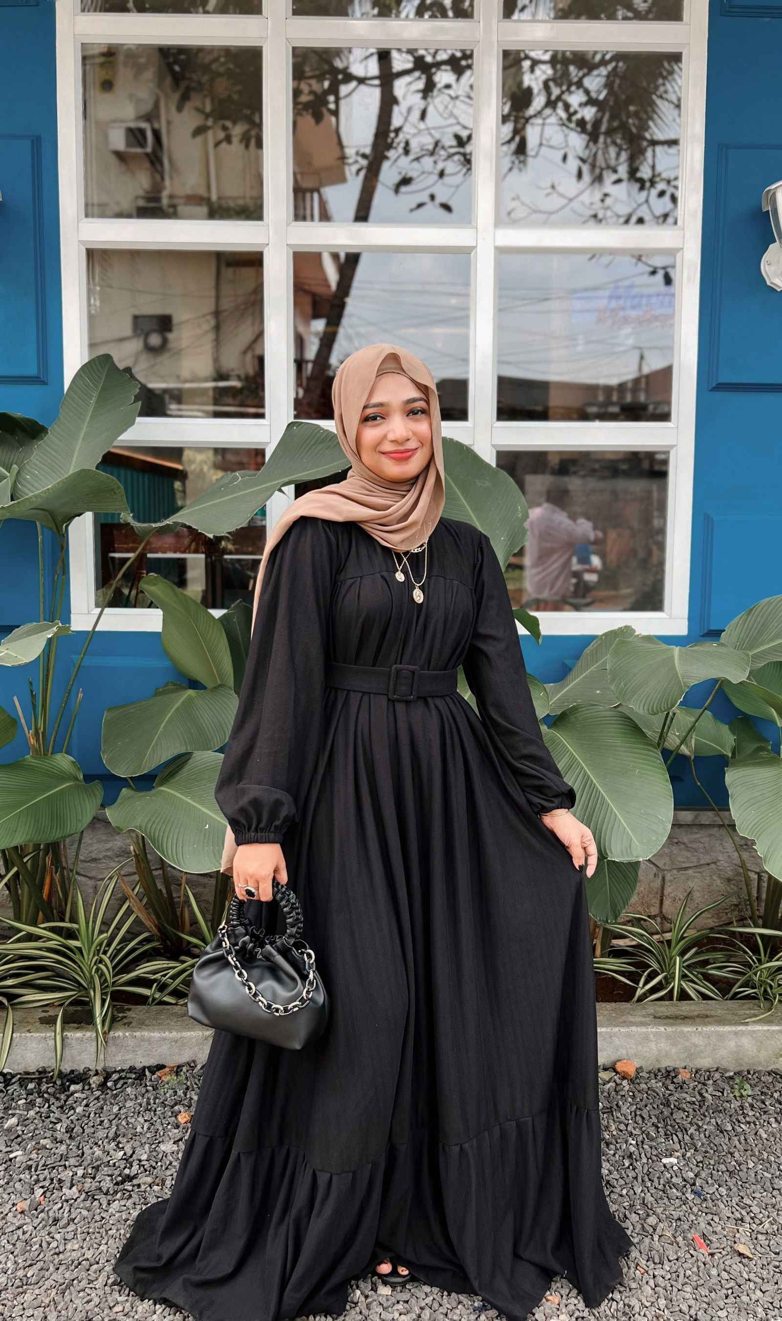 Elegant modest black maxi dress from Yezwe with a belt and long sleeves, perfect for stylish occasions