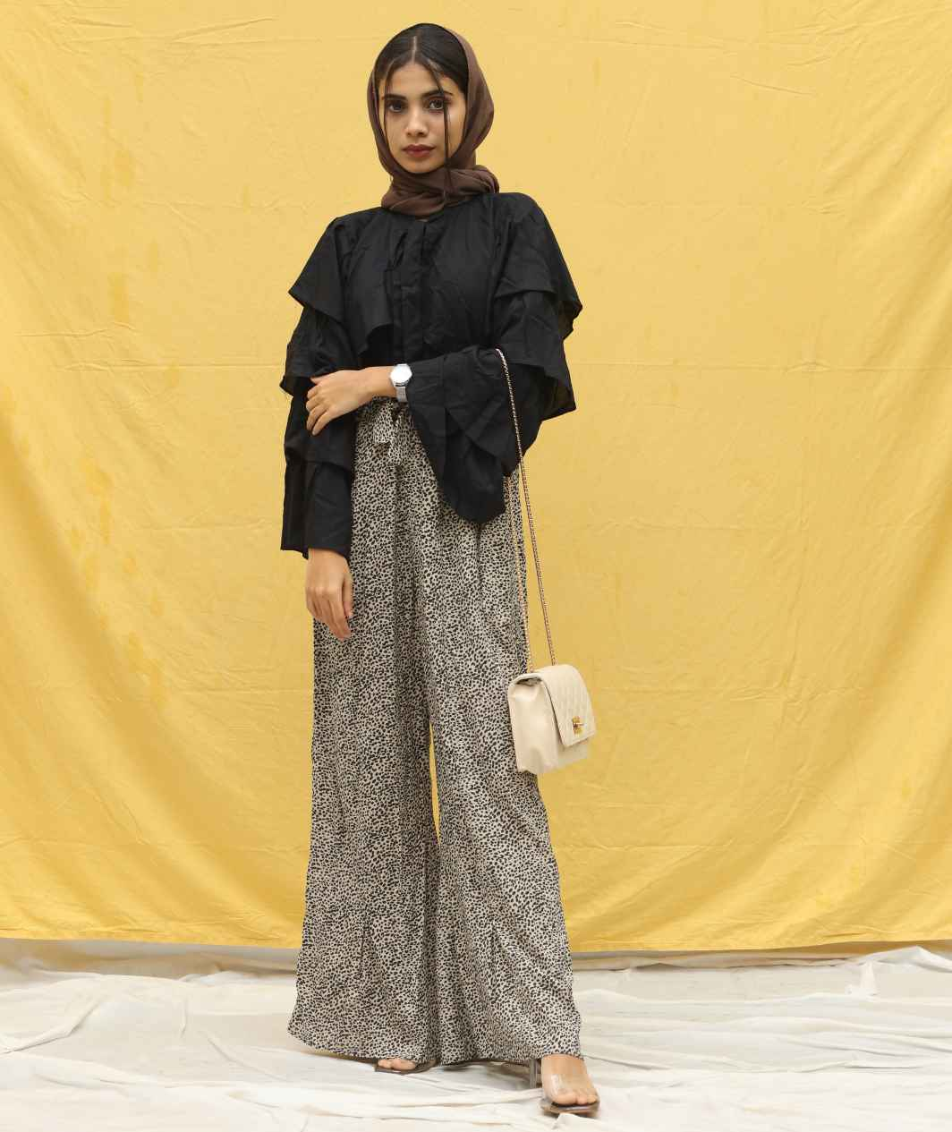 Yezwe modest co-ord set featuring a layered black top and wide-leg patterned pants