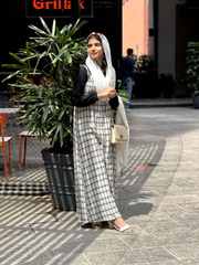 Yezwe modest dungaree dress in black and white plaid, perfect for stylish casual occasions