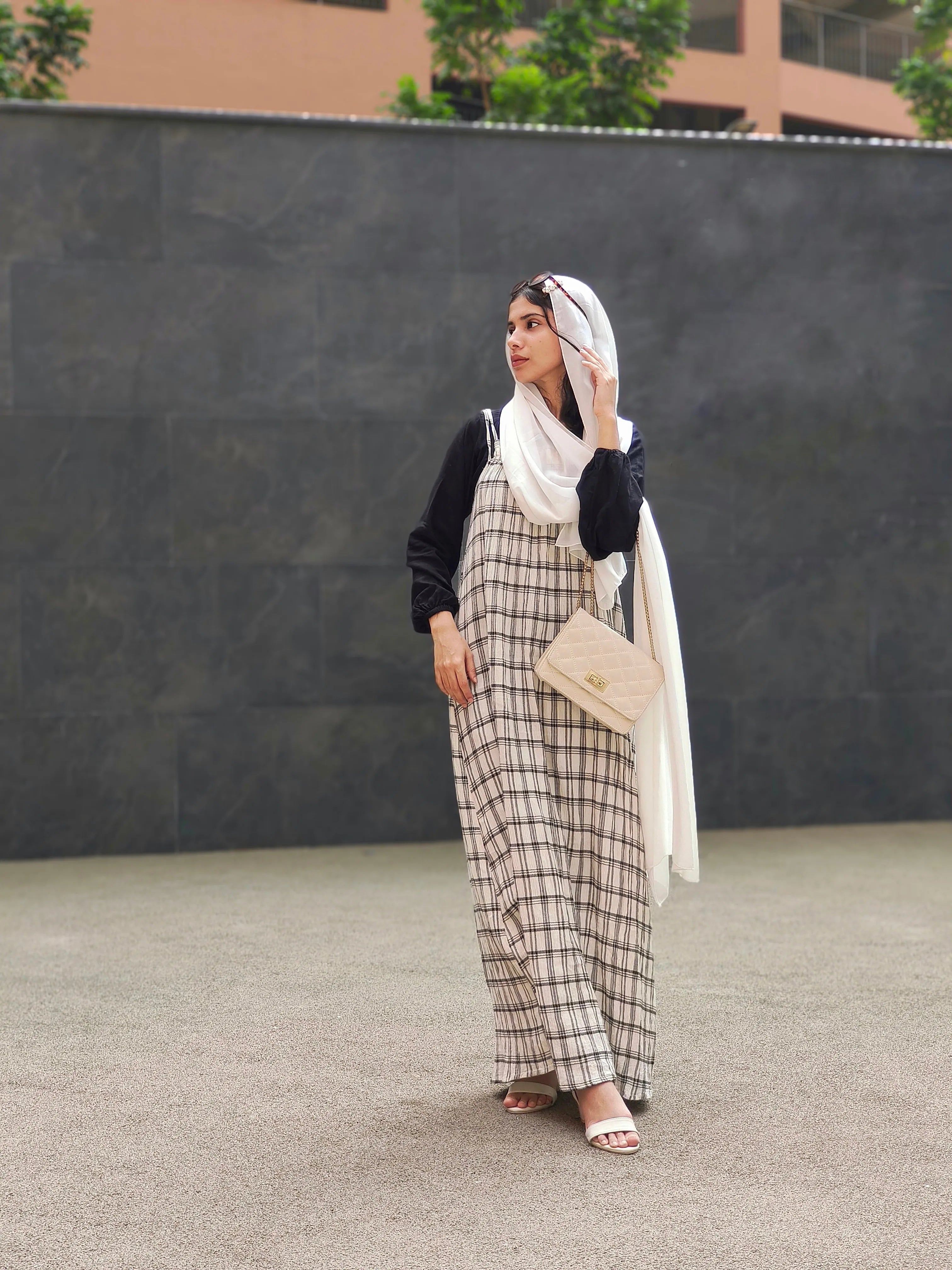 Yezwe modest dungaree dress featuring a stylish checkered pattern, perfect for casual occasions