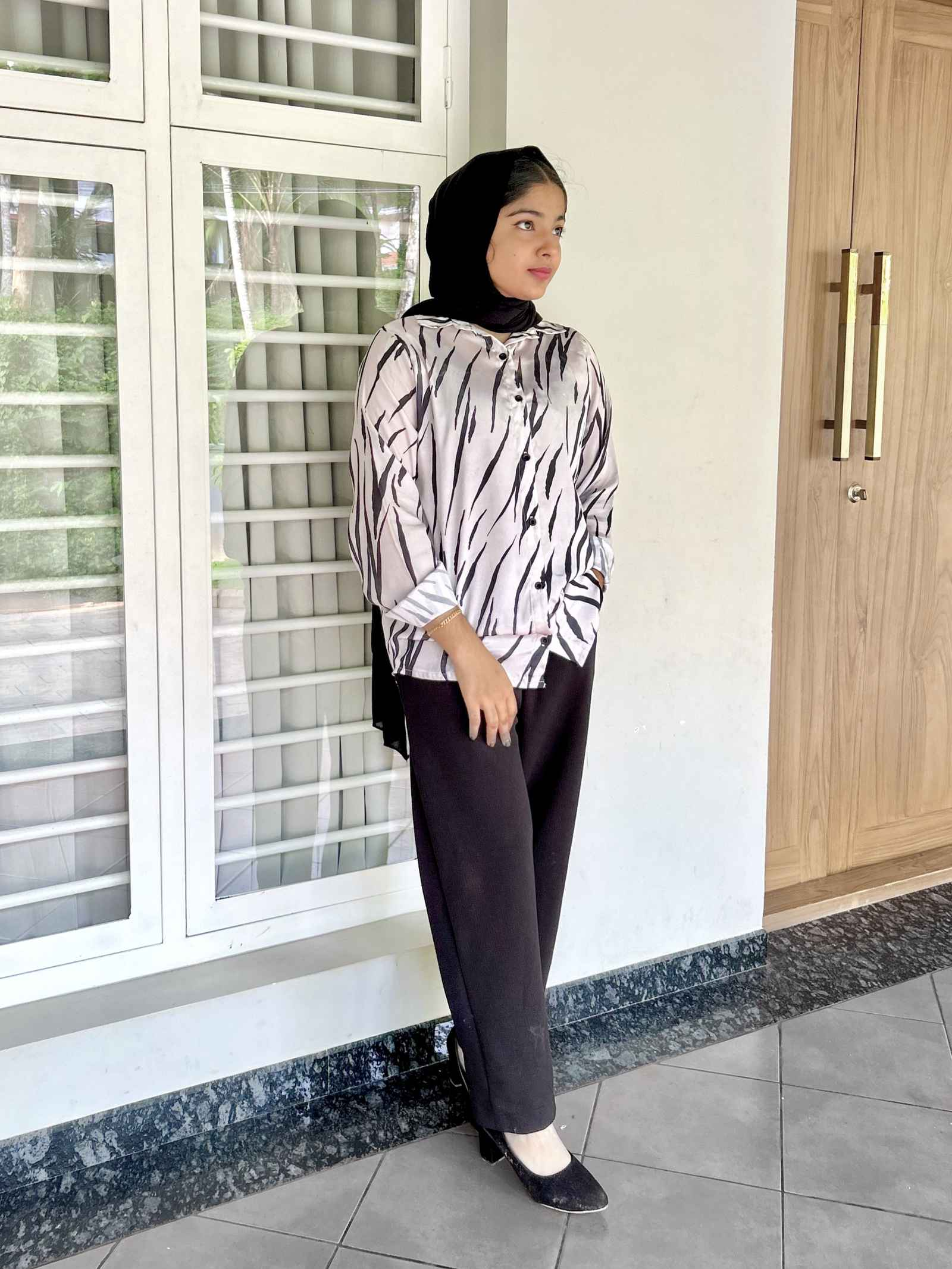 Yezwe modest fashion two-piece featuring a stylish top and pants combination for a chic look