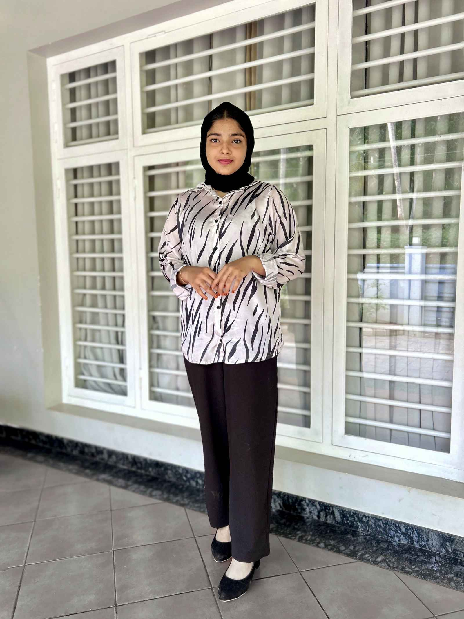 Yezwe modest fashion two-piece outfit featuring a stylish top and elegant pants for modern looks