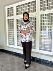 Yezwe modest fashion two-piece outfit featuring a stylish top and elegant pants for modern looks