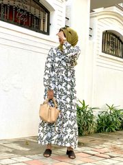 Modest green leaf maxi dress by Yezwe with long sleeves and a flowing design for elegant summer wear