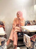 Yezwe modest jumpsuit with belt in soft peach color, perfect for casual or formal occasions