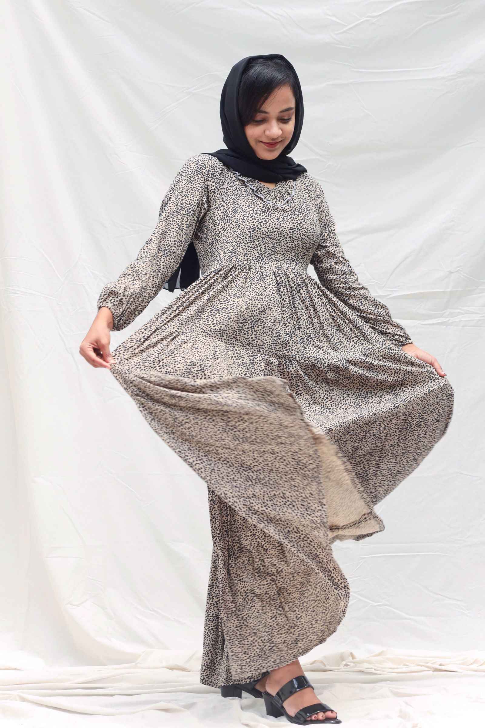 Yezwe modest leopard print maxi dress with long sleeves and flowing skirt for elegant comfort