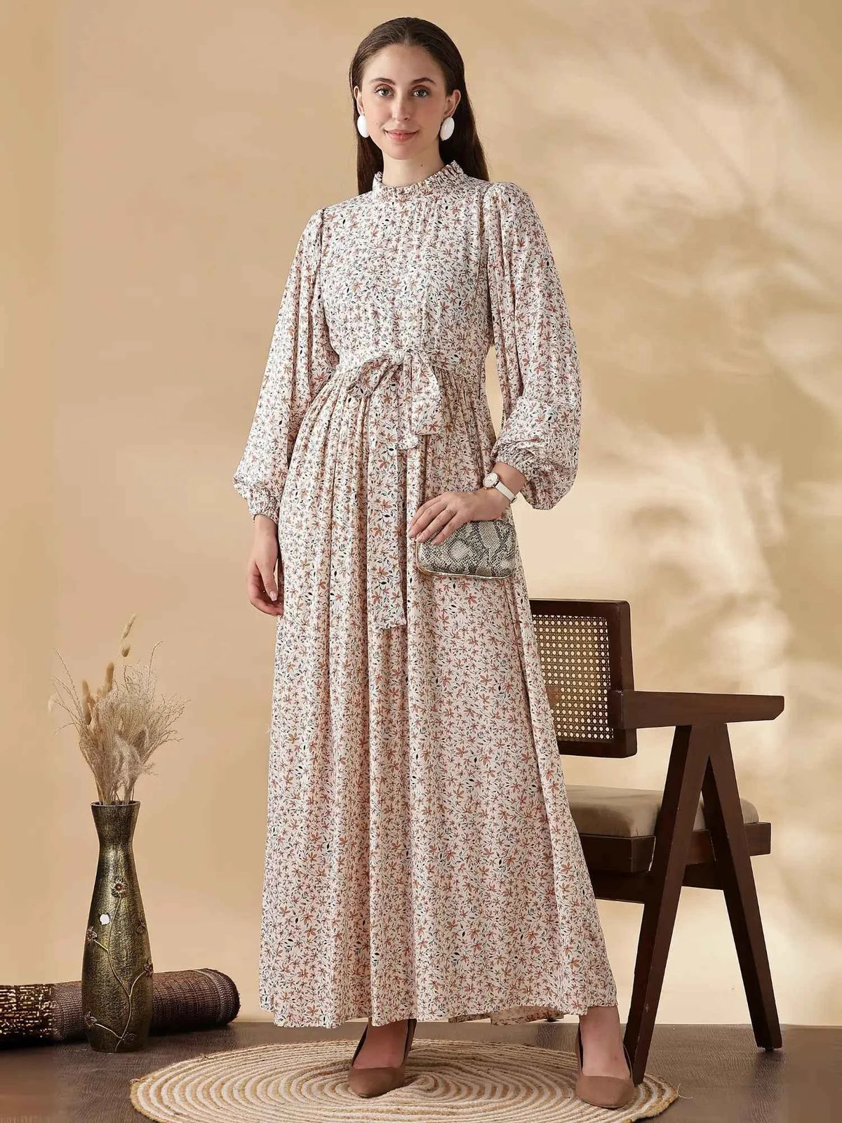 YEZWE modest long sleeve maxi dress in floral design with a tied waistband and elegant sleeves