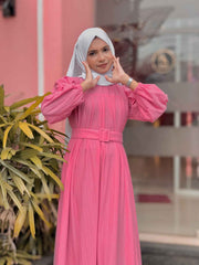 Yezwe modest maxi dress with belt in pink, featuring long puff sleeves and a flattering silhouette
