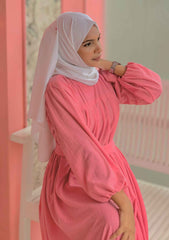 Yezwe modest maxi dress with belt in pink featuring a relaxed fit and long sleeves