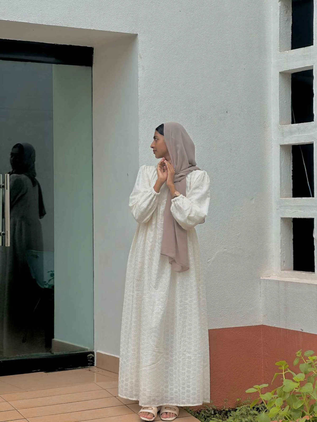 Modest off white maxi dress by Yezwe with long sleeves and elegant design, perfect for various occasions