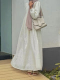 Yezwe modest off white maxi dress with textured fabric and long sleeves, perfect for elegant occasions