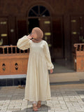 Yezwe modest off-white maxi dress with long sleeves and textured fabric, perfect for casual outings