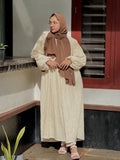 Yezwe modest off-white maxi dress with long sleeves and a flowing silhouette for elegant summer wear