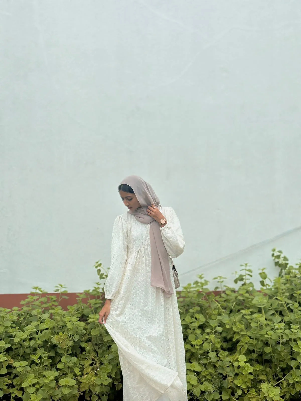 Elegant modest off white maxi dress by Yezwe with long sleeves and flowing design, perfect for any occasion