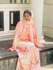 Modest peach maxi dress by Yezwe featuring elegant floral patterns and long sleeves