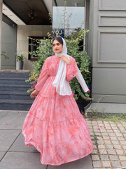 Modest peach pink maxi dress with flowing layers and long sleeves, perfect for formal occasions
