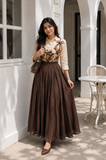 Yeziwe modest skirt and top set featuring a floral design and a flowing brown skirt for stylish occasions