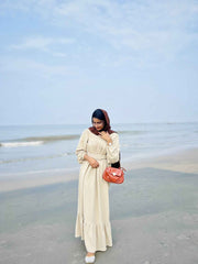 Yezwe Maxi Dress in Beige for women featuring a tiered design, perfect for modest wear dresses online