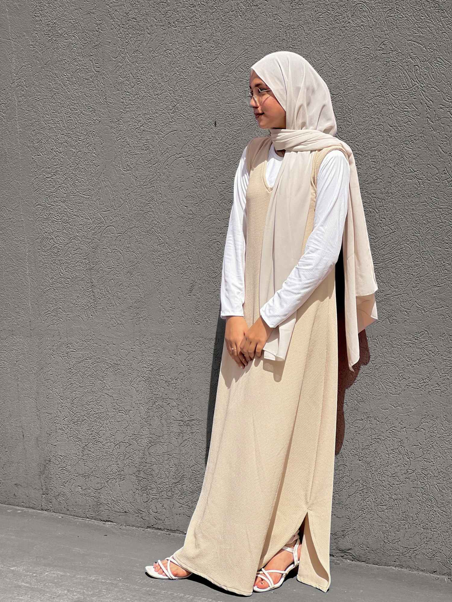 Yezwe full length modest wear dress in beige with a stylish layered design and subtle side slit