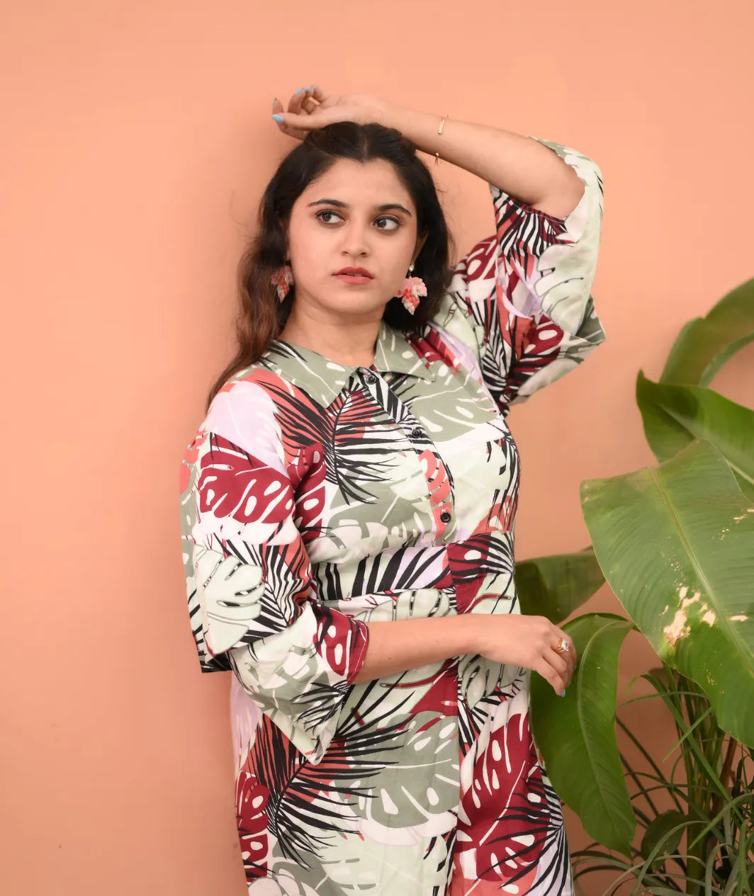 Yezwe modest wear jumpsuit with vibrant floral patterns and classy button-up front design