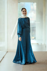 Elegant Yezwe modest wear maxi dress in teal with long sleeves and a flowing silhouette
