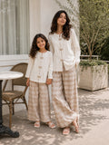 Mom and daughter matching co ord set in beige checkered pattern for stylish family outfits