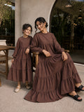 Mom and daughter matching tiered maxi dress set in brown with long sleeves and ruffled layers