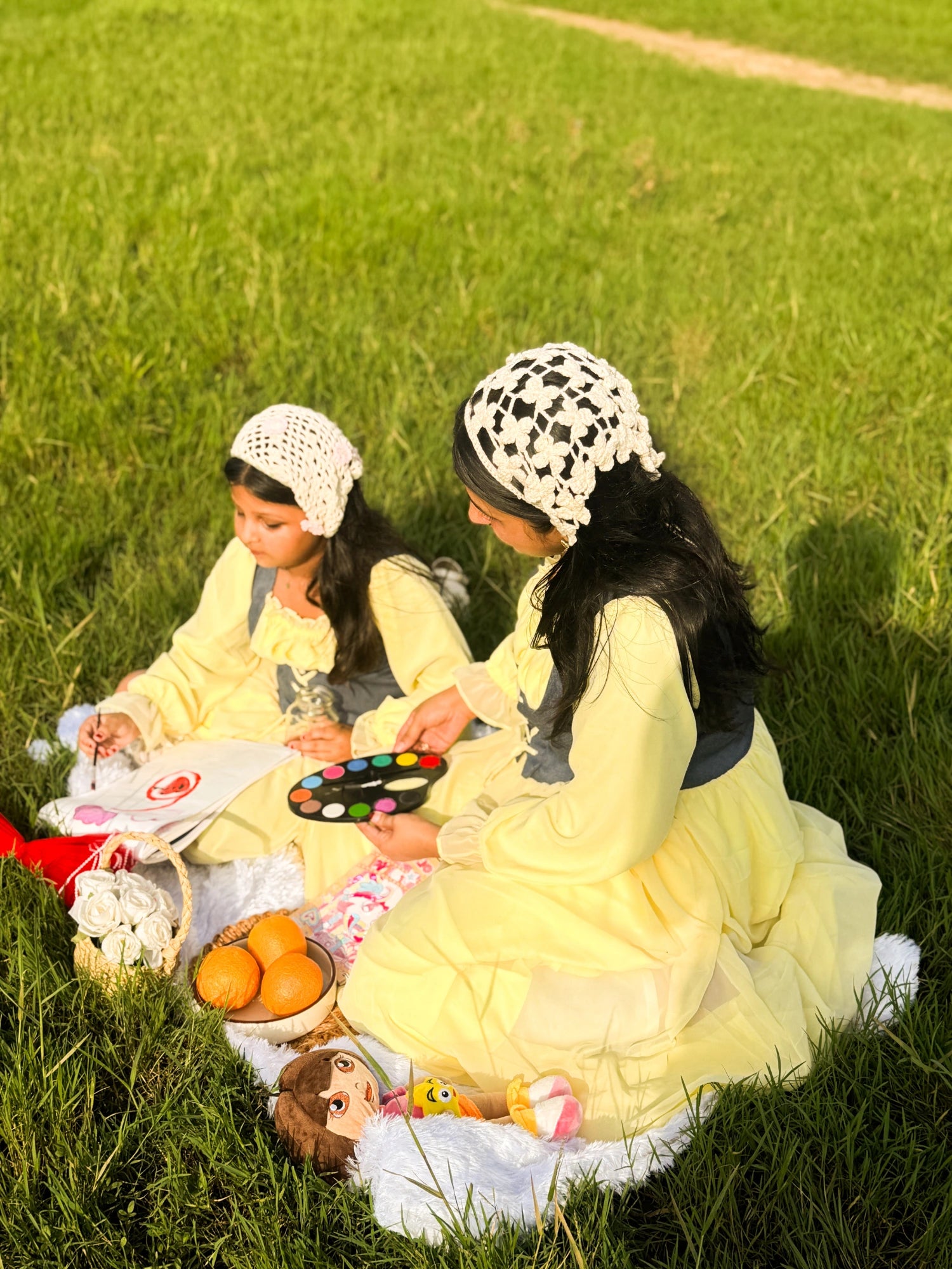 Mom & Daughter Matching Pastel Yellow Corset Maxi Dress Set with Denim Bodice in outdoor picnic setting