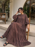 Oversized Striped Tiered Maxi Dress for Women | Loose Flared Modest Dress shown on a model in a relaxed setting