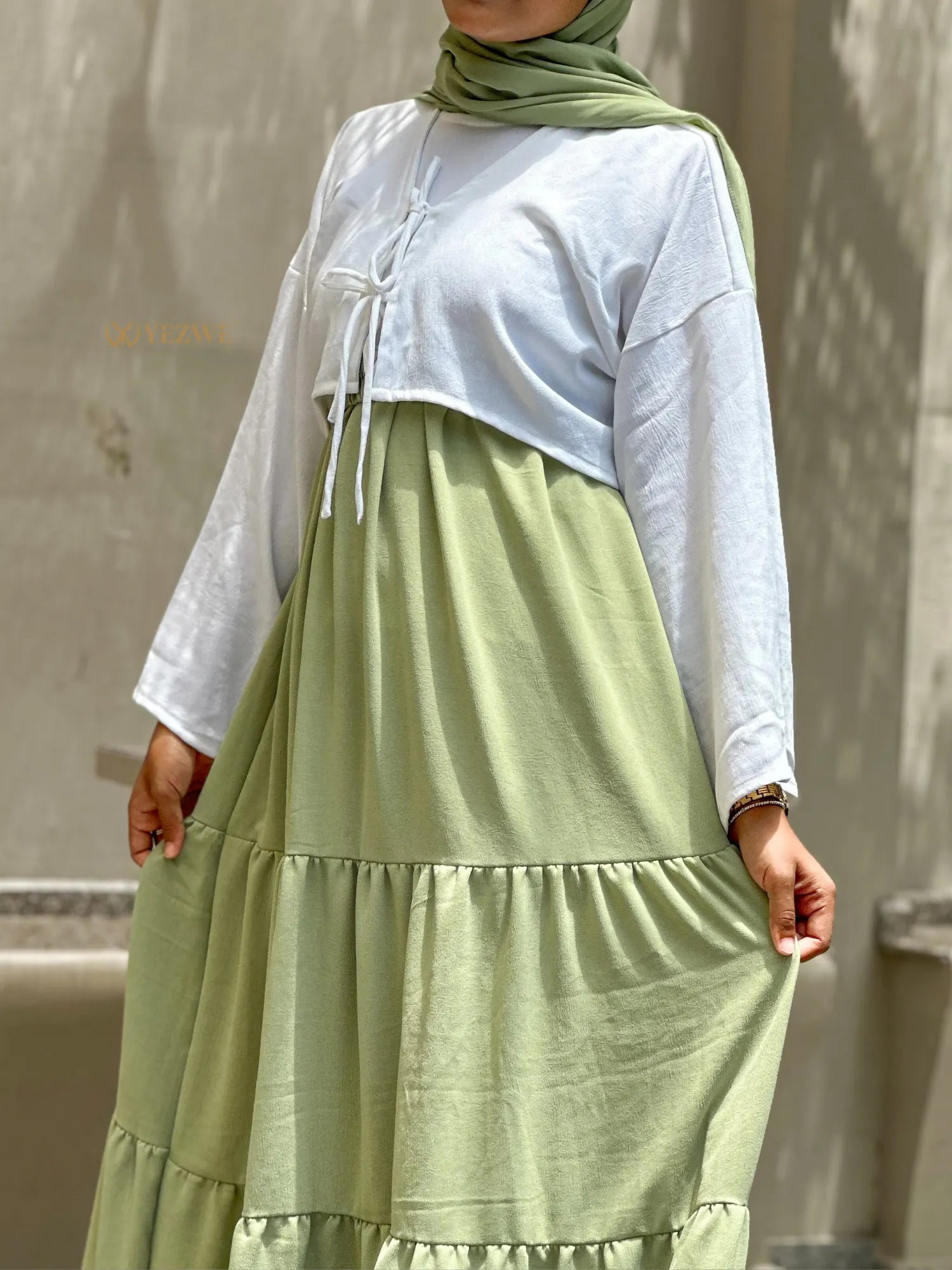 Pastel Green Modest Maxi Dress with Tiered Skirt and Long Sleeves for Comfortable Style
