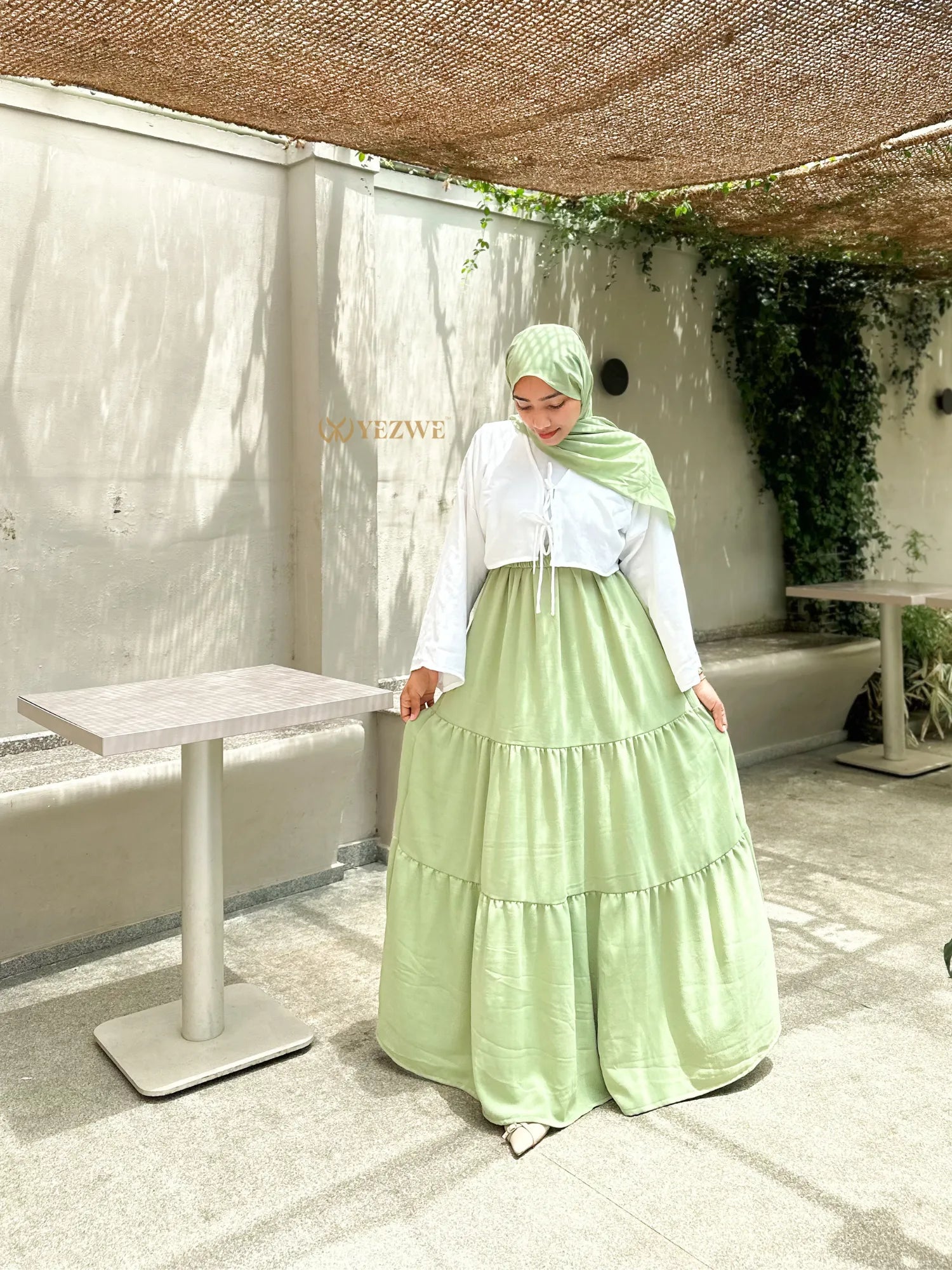 Pastel Green Modest Maxi Dress with Layered Skirt and Long Sleeves from YEZWE