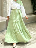 Pastel Green Modest Maxi Dress with Tiered Skirt and Long Sleeves from YEZWE