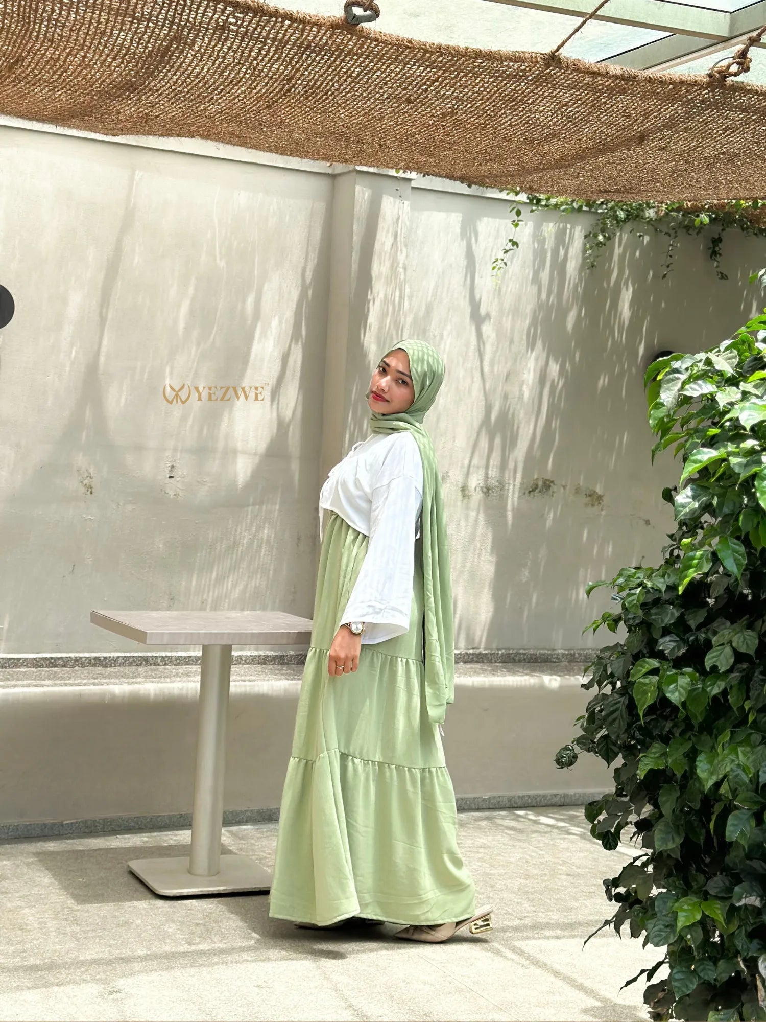 Pastel Green Modest Maxi Dress by YEZWE with tiered design and long sleeves