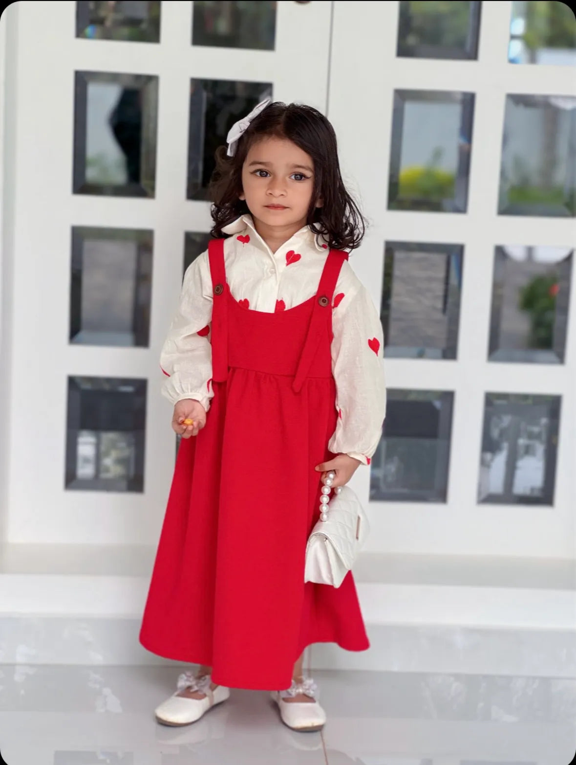 YEZWE Pinafore For Junior Girls in bright red paired with white blouse featuring heart details