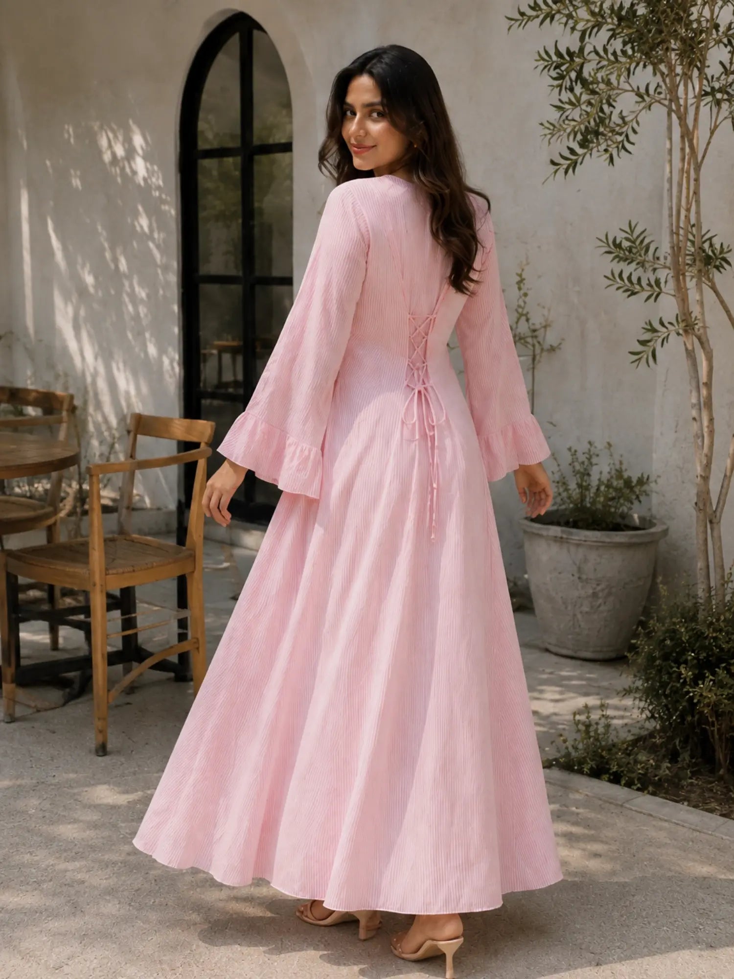 Stylish pink striped maxi dress with flowy sleeves and back lace-up detail by YEZWE