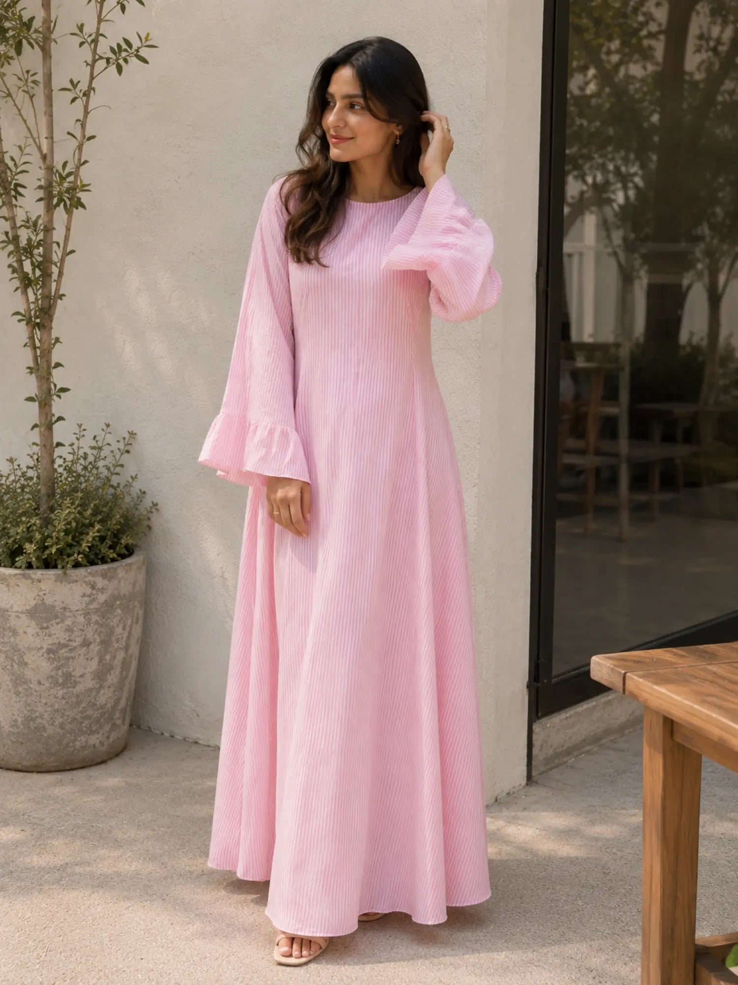 YEZWE pink striped maxi dress with long sleeves and ruffled cuffs for a stylish look
