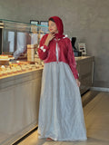 Front view of Pinterest-inspired bow detail maxi dress for women in red and white, featuring layered design, modest fit, embroidered skirt, and hijab styling