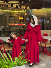 Yezwe reddish maroon maxi dress for women paired with a matching dress for girls, perfect for family outings